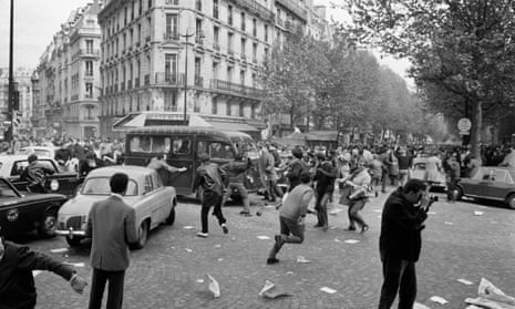 Protesters attack a police vehicle on Boulevard Saint Germain, May 1968.