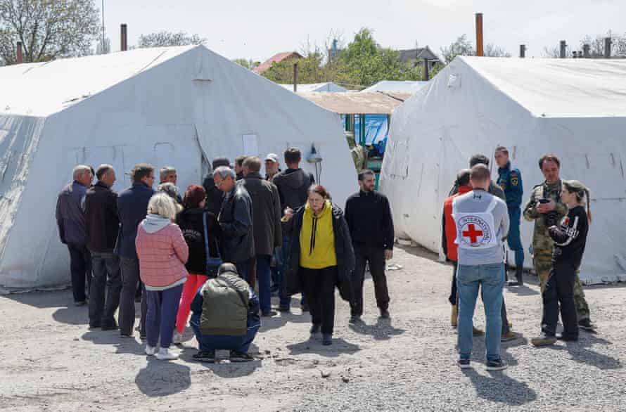 Civilians who were evacuated from Azovstal gather in the temporary accommodation center in Bezimenoye near Mariupol.
