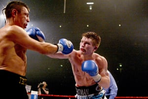 Ricky Hatton (right) throws big right at Kostya Tszyu during their IBF light-welterweight title fight.