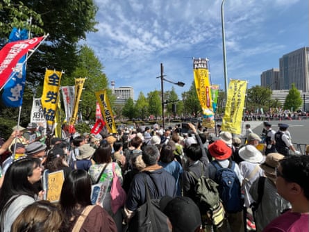 Protesters rally in support of Japan’s pacifist constitution during a demonstration outside the country’s parliament in Tokyo on 19 April.