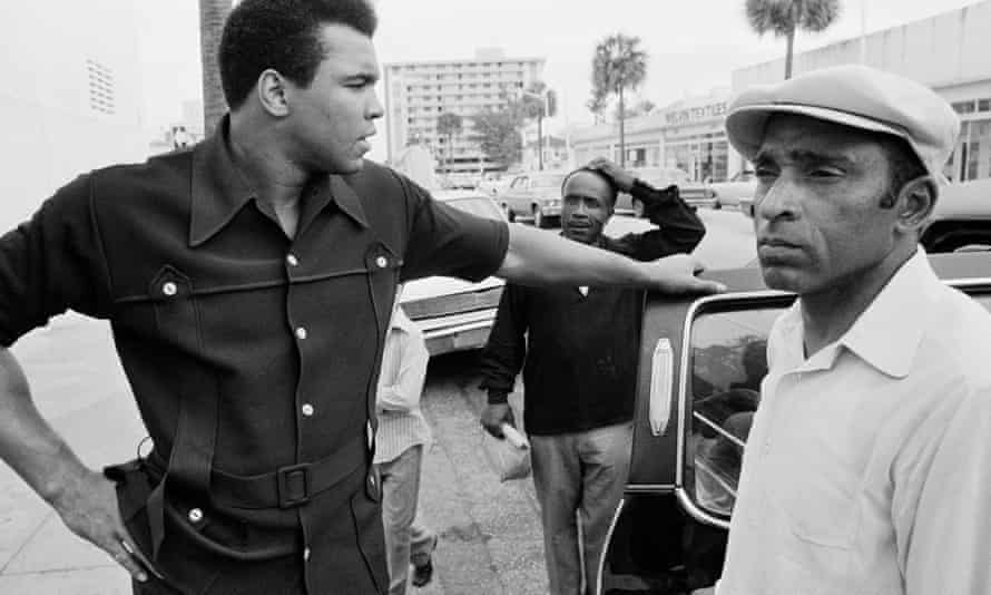 Ali with chauffeur and bodyguard, Reggie Thomas.