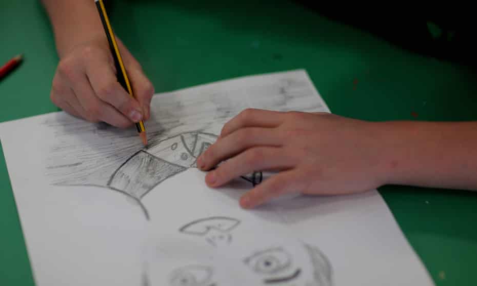 A child drawing in school