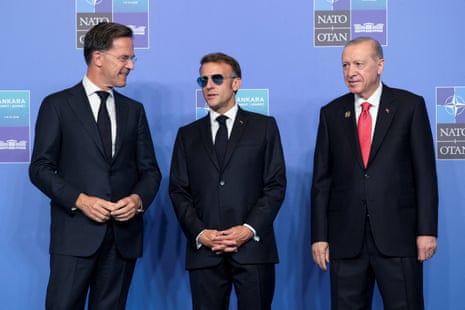 Turkish president Tayyip Erdoğan and NATO secretary general Mark Rutte welcome French president Emmanuel Macron at a Nato leaders' summit in Ankara, Turkey.