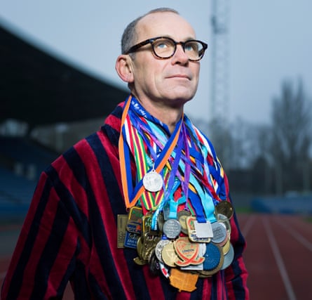 Back on track: Martin with his medal collection.