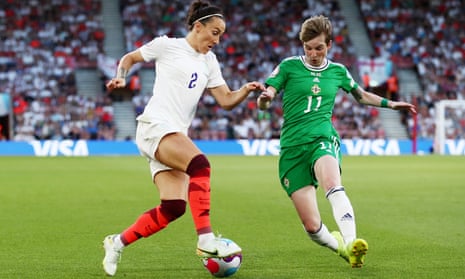 Lucy Bronze is challenged by Kirsty McGuinness  of Northern Ireland during Euro 2022