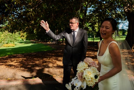 Daniel Andrews is approached by a bride for a selfie.