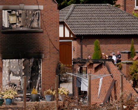 Housing secretary Angela Rayner views the burnt out remains of houses in Stourbridge