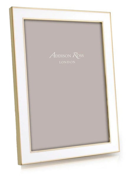 a white and gold frame