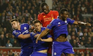 Chelsea’s Gary Cahill, Nemanja Matic and John Obi Mikel in action with Liverpool’s Christian Benteke.