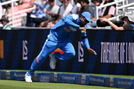 Rahul takes the catch but falls over the rope