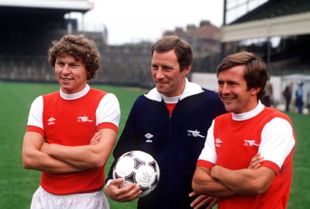 Clive Allen, left, poses with Terry Neill and John Hollins after signing for Arsenal in 1980.