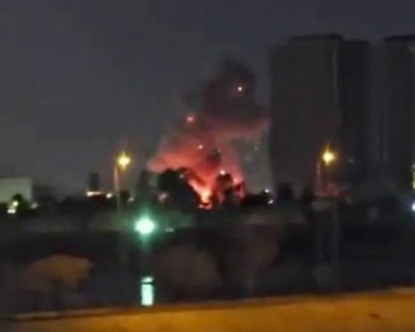Smoke and fire rise during reported strikes at the US embassy, according to Iraqi security sources, in Baghdad, Iraq, in a still taken from social media video