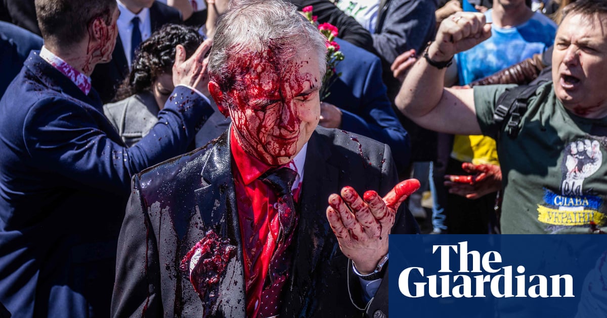 Russian ambassador to Poland pelted with red paint at VE Day gathering – The Guardian