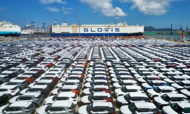 Vehicles awaiting shipment at Yantai Port, Shandong.