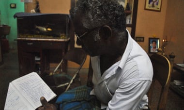Jawahar’s father K. Kumaran reading from his son’s diary