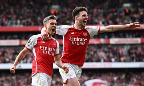 Arsenal’s Leandro Trossard celebrates scoring their second goal with Declan Rice.