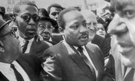 Dr Martin Luther King (center) surrounded by leaders of the Memphis sanitation strike.
