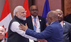 India's prime minister, Narendra Modi, welcomes the African Union chair, Azali Assoumani, to the first session of the G20 summit in Delhi