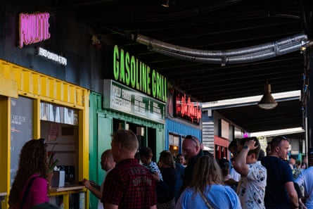 People lined up in front of the Gasoline Grill in Broens Gadekokken, the street food area in Copenhagen harbour.