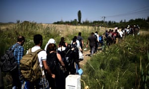 Syrian migrants after crossing the border between Macedonia and Serbia in August 2015