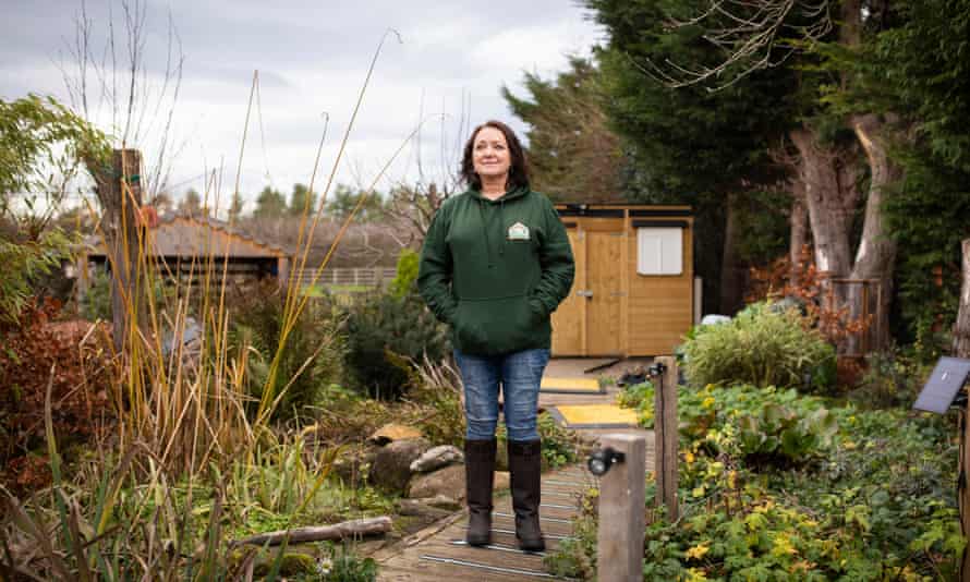 Sandra in her garden, where she has created a hog-friendly habitat