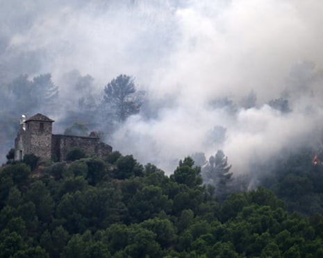 View of the Ermita de Santa Barbara surrounded by smoke in Onda, Castellon province, 71 kilometres north of Valencia, Spain.