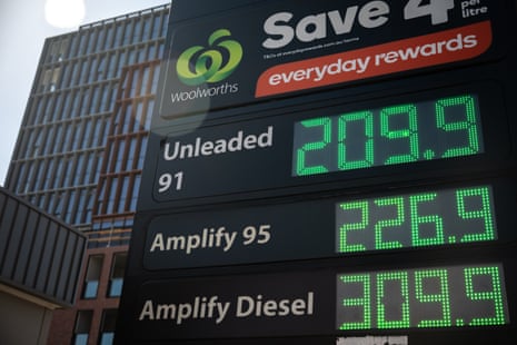 A sign advertising petrol prices