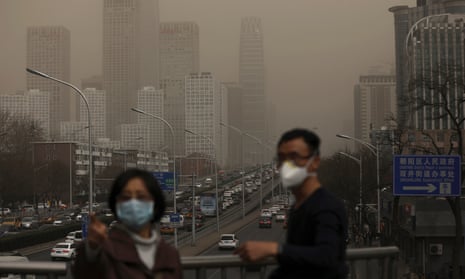 People wearing facemasks in Beijing, China, in 2018
