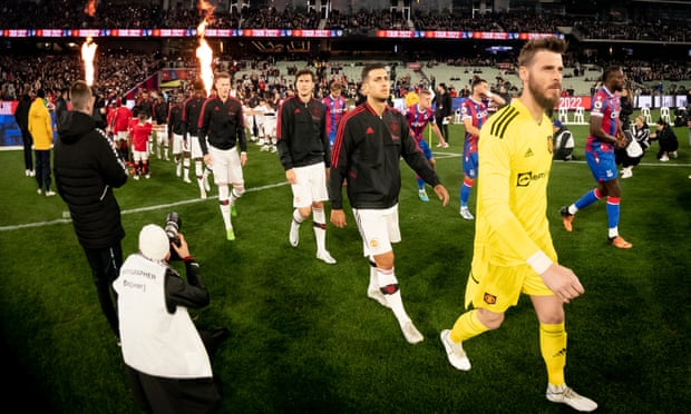 David de Gea leads the Manchester United team on to the pitch in Perth