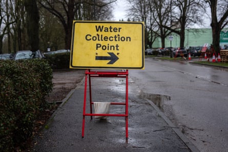 A sign is displayed at at an emergency bottled water distribution point in Maidstone