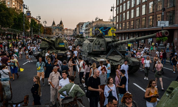 People look at destroyed Russian military equipment at Khreshchatyk street in Kyiv, that has been turned into an open-air military museum ahead of Ukraine’s Independence Day on August 24. (Photo by Dimitar DILKOFF / AFP) (Photo by DIMITAR DILKOFF/AFP via Getty Images)
