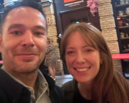 A smiling couple on a first (probably only) date