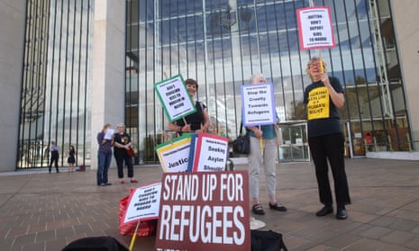 Protesters outside the high court in Canberra on Wednesday morning. The court ruled that the government’s offshore detention regime is lawful under the constitution. 