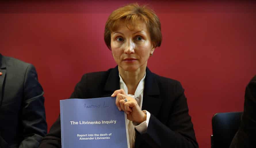 Marina Litvinenko holds a copy of the inquiry report on 21 January.