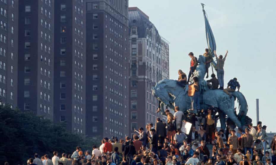 Battle lines … Demonstrators swarm a statue in Grant Park, Chicago, during the 1968 Democratic national convention