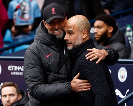 Pep Guardiola and Jürgen Klopp hug before the Premier League match between Manchester City and Liverpool in April 2023