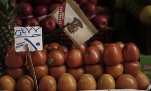 Tomatoes for sale for 10 Egyptian pounds (93p) a kilogram in Tawfiqia market in Cairo.