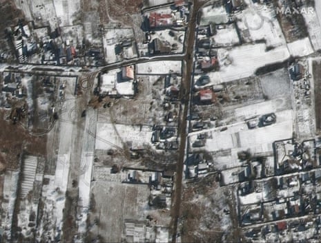 Equipment and troops deployed in Ozera, northeast of Antonov airport, Ukraine, on 10 March.