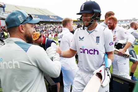 Brendon McCullum congratulates Joe Root
