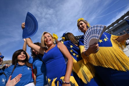 Team Europe fans cheer on their players at the opening ceremony for the Solheim Cup.