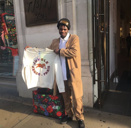 Yves Alawe with his Kenzo X H&amp;M purchase.