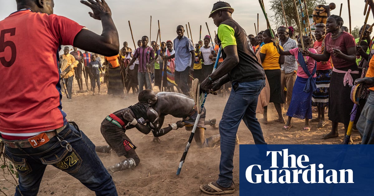 Sudan's Nuba wrestling: a celebration of strength at a time of conflict in pictures