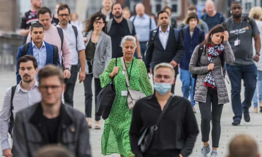 Commuters on London Bridge. Prof Sir Andrew Pollard, director of the Oxford Vaccine Group, said: ‘The Delta variant will still infect people who have been vaccinated.’