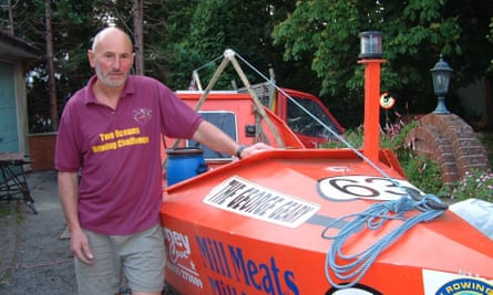 Graham and George Geary, a 22-year-old row boat he built in his garden.
