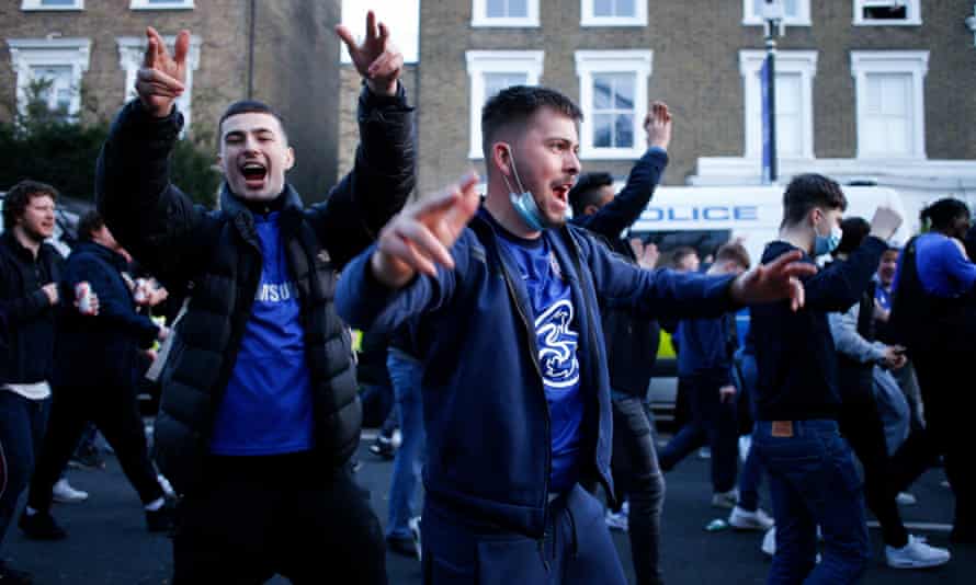 Chelsea fans celebrate after their club announced its intention to withdraw from the European Super League. Football fans were united in opposition to the new competition.