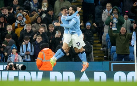 Rayan Cherki and Phil Foden celebrate during City’s win against Sunderland.