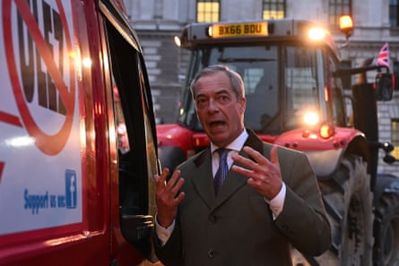Nigel Farage speaks to the driver of a van while ahead of him farmers drive tractors in central London