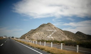 The letter Z”is seen painted on a hill next to the toll booth at the freeway between Monterrey and Torreón, in the Mexican state of Coahuila in March 2010. The Z refers to the Zetas drug cartel.
