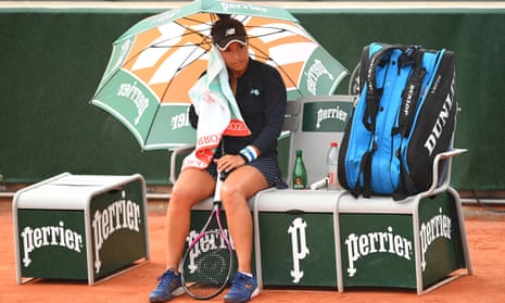 Heather Watson cuts a dejected figure at a change of ends against Fiona Ferro at the French Open.