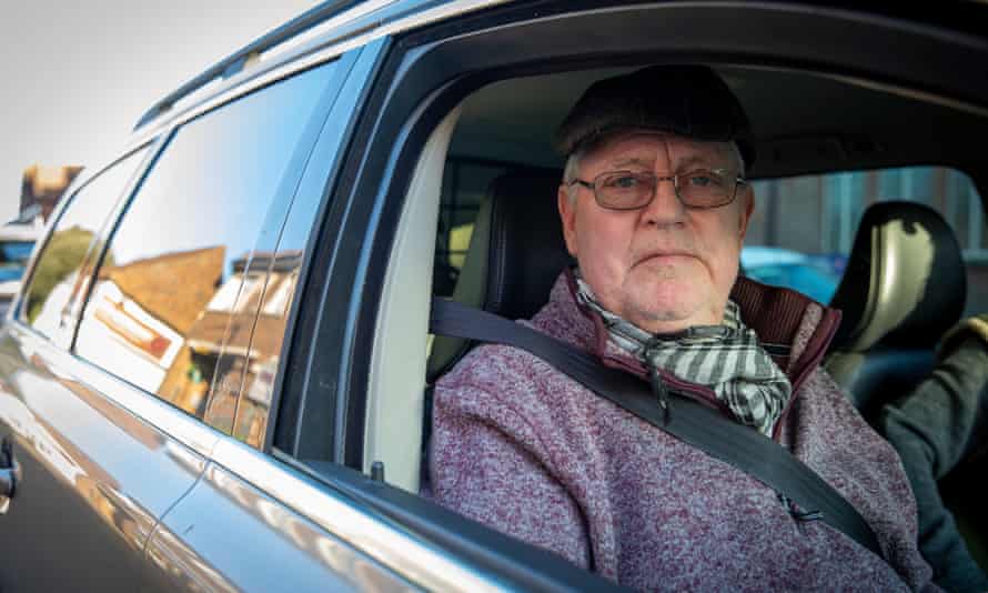 Ray Biggs, waiting for his wife outside the butcher in New Romney